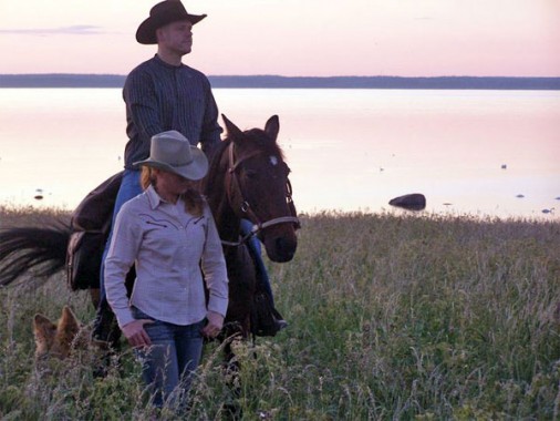 A picture on a man riding a horse from Tjauls Gård in Gotland